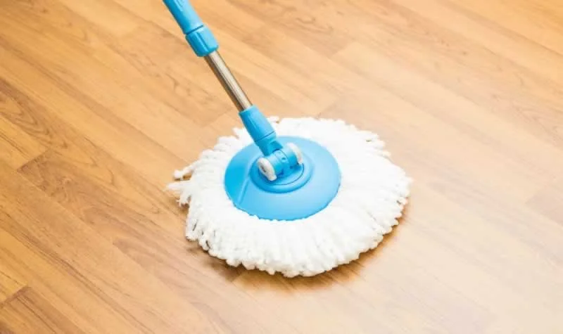 Mistake #1: Using Too Much Cleaner and Leaving a Film Behind for 7 Sticky Floors Mistakes That Ruin Your Clean Home